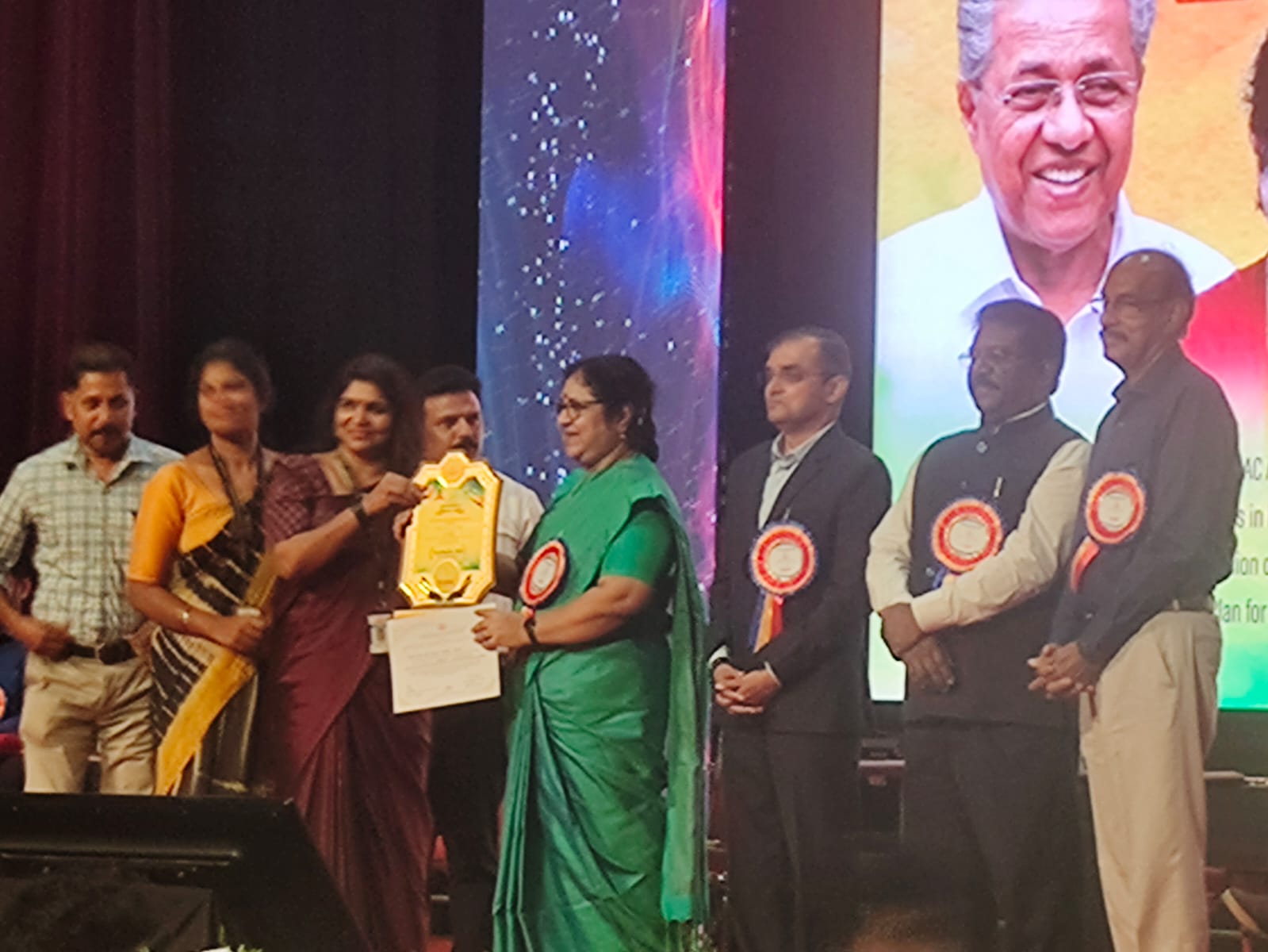 Receiving Excellentia award from Honourable minister of higher education